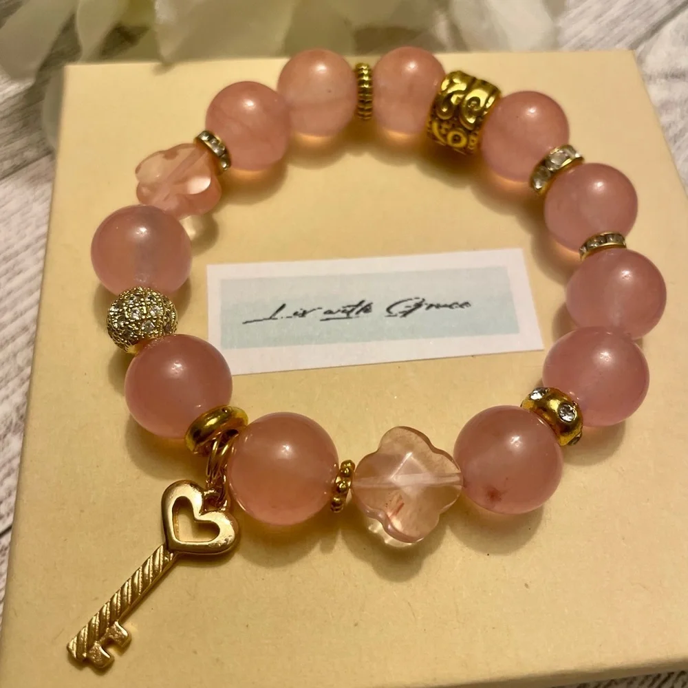 Creamy Pink 12mm Quartz Bracelet with Heart Key charm gold accents